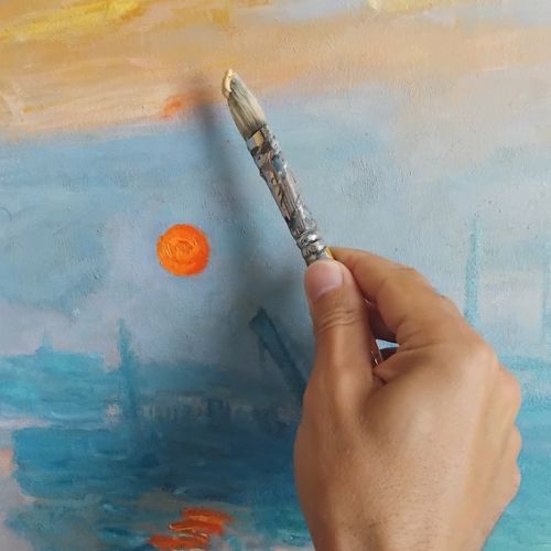 Painter recreating “Impression, Sunrise” after Claude Monet